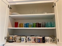 A Cabinet of Various Glasses and Mugs