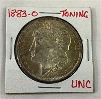 1883 O UNC US Morgan Silver Dollar Toning