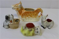 3 pc. pin cushions, 1 porcelain milk cow creamer