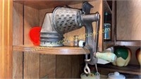 Vintage kitchen grader with green handle and