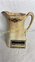 Old floral pitcher