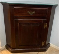 899 - GLASS TOP CORNER CABINET 29" X 22" AS IS