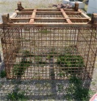 Large steel storage cage is very heavy and is
