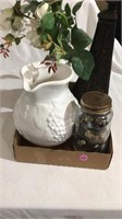 Shelf 
, fake flower, pitcher, buttons