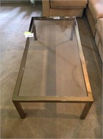 Gold rectangle shaped long end table glass top