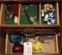 Contents of bottom of hutch to include: flatware,