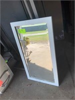 beveled glass mirror (approx. 20" X 26.5")