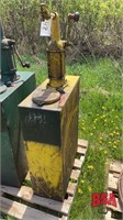 Vintage oil tank with hand pump
