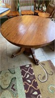 Antique oak clawfoot 43" round table with 6 chairs
