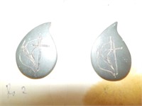 Early pair of religious pins