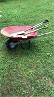 Radio flyer wheel barrow , shovels