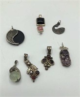 7 Sterling Silver Necklace Pendants 31.4 Grams