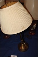 brass coloured desk lamp