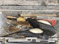 Tool box with masonry tools, knee pads, rodders