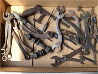Old wrenches, screwdrivers & hacksaw.