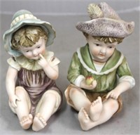 Pair piano baby figurines - 7" tall