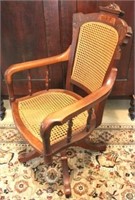 Victorian walnut caned swivel office chair