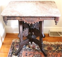 Victorian carved walnut marble top table