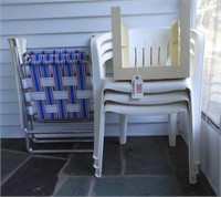 Three white plastic HD patio chairs, (2) folding