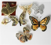 Jewelry flat full of figural butterfly pins