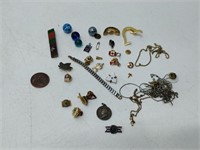 costume jewelry, pins, marbles, etc.