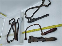 lot of hardware - pipe wrenches, hammer, etc.