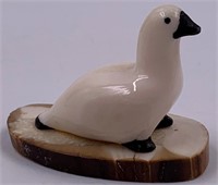 Ivory snow goose on fossilized Ivory base signed b