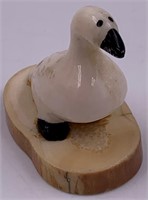 Harris Miklahok Ivory carving of a snow goose on a