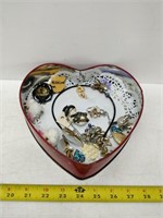 old valentines tin full of vintage jewelry