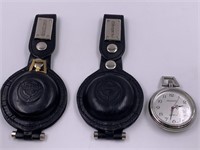 2 battery operated pocket watches with leather bel