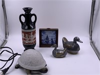 Box lot with pewter, ducks, turtle lamp, glass bot