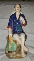 Porcelain oriental figurine