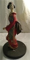 Carved wooden Asian lady