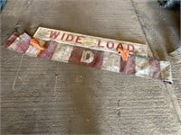 "Wide load board" and cloth "d" sign