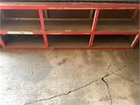 Red wooden shelving unit 8' W X 16" D X 33.5" H