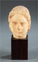 Late Antiquity or Medieval tonsured marble head.