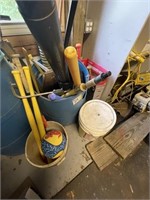Barrel of misc. tools, bats