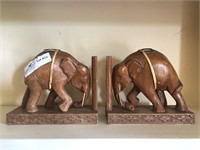Hand carved elephant book ends