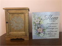 2 unmatched items jewelry box and candle holder.