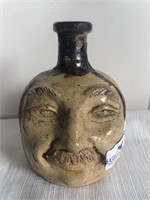 Pottery face jug by E.Miles 6”