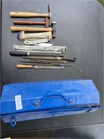 Metal toolbox with files and hammers