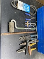 Metal toolbox with assorted electrical stripping
