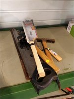 lot of assorted tools, crowbar, saws, mallet, etc.
