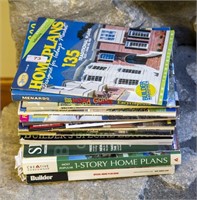 Stack of home plan magazines and books