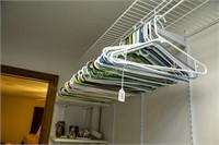 Large group of plastic hangers