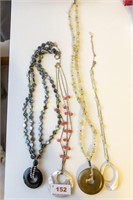 Group of four mother of pearl necklaces