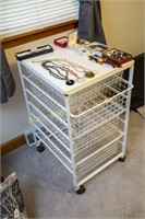 Storage rack with four slide out baskets