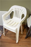 Pair of plastic stacking patio chairs