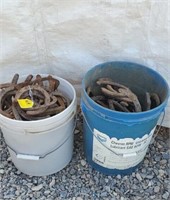 2- 5 gallon buckets full of used horseshoes