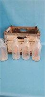 4 quart milk bottles with crate